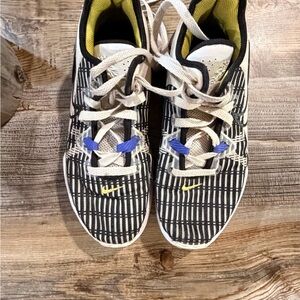 Nike Kids Black and White Sneakers with Yellow Accents